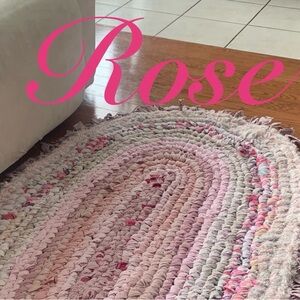 Handmade fabric rug. Made with up cycle fabric.